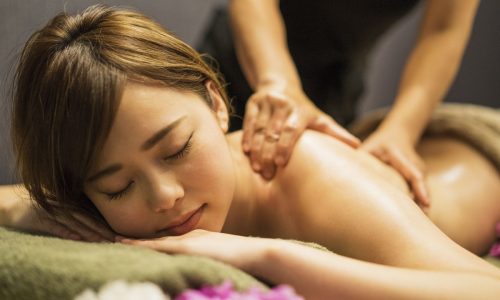 Young woman receiving relaxing massage